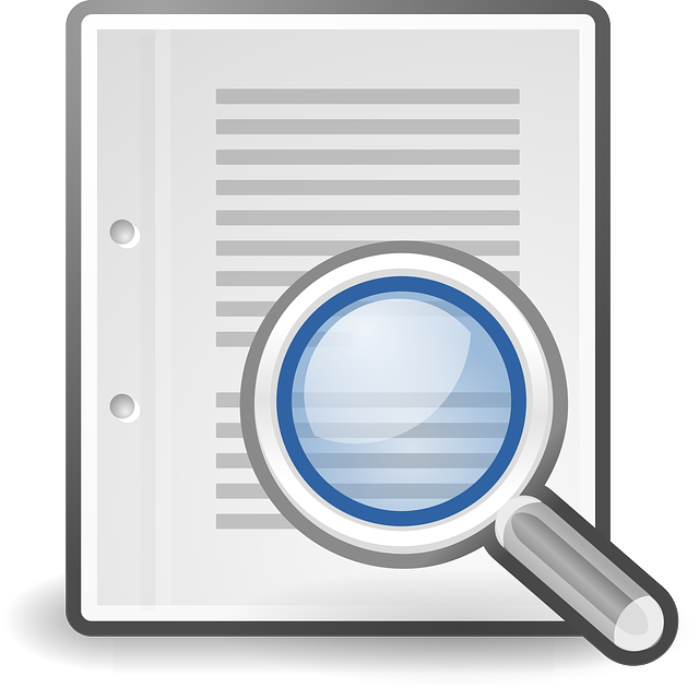 An image of a magnifying glass on a paper, representing findability.